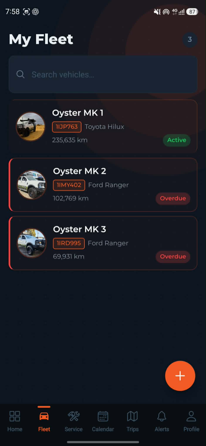 FleetTrack Pro fleet tab showing vehicle list with service status